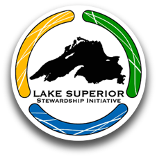 Logo of the Lake Superior Stewardship Initiative. A black Lake Superior outline is inside a circle broken into yellow, green, and blue sections.